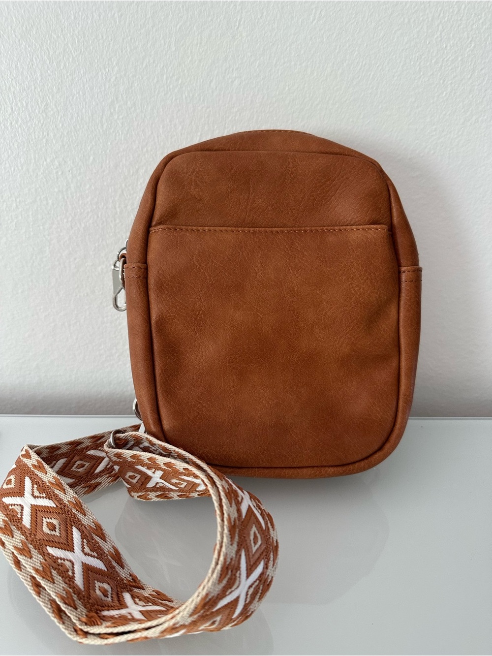 Unbranded brown mini shoulder-croosbody bag with patterned strap.New without tag